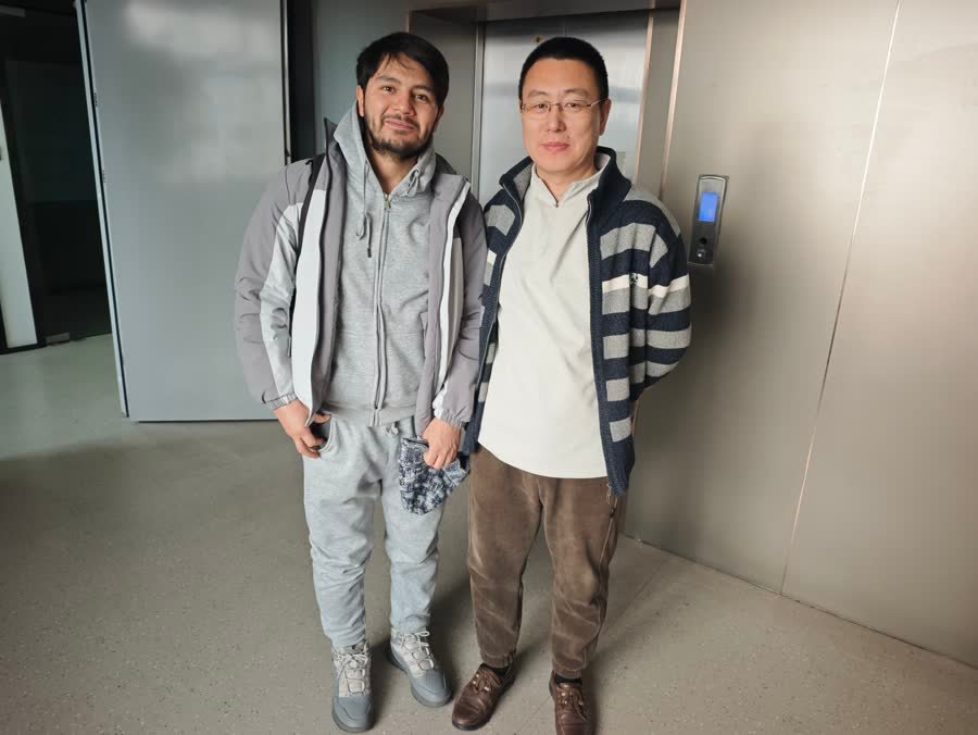 Customer from Kazakhstan beside a low bed trailer